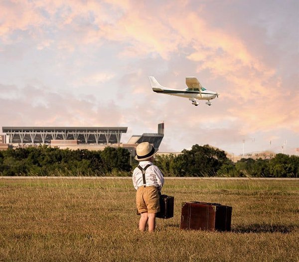 Easterwood-Airport-Kid-Watching-Plane.jpg